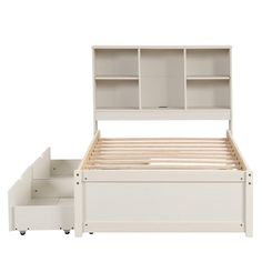 a white bed with two drawers and a bookcase on top of the headboard