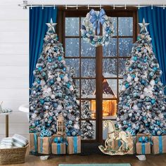 a christmas tree with blue and silver decorations in front of a window shower curtain set