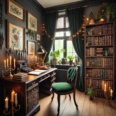 a desk with a chair, bookshelf and candles in front of the window