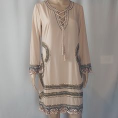 New Whit Tags Venus Beige Beaded Embellished Long Slevee Tassel Tie Dress Size Small Shell Fabric /Exterior 100% Polyester The Measurements Are In The Photos New With Small Stains Long Sleeve Tassel Dress For Beach, Bohemian Beaded Dresses For Spring, Spring Beach Beaded Dress, Long Sleeve Embellished Festival Dress, Bohemian Embellished Mini Dress, Bohemian Sequin Beach Dresses, Embellished Mini Dress For Vacation And Spring, Spring Embellished Mini Dress For Vacation, Spring Vacation Embellished Mini Dress