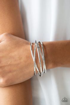 Glistening silver bars crisscross across the wrist, coalescing into an airy cuff. Sold as one individual bracelet. Party Bracelets, Silver Bar Bracelet, Turquoise Stone Jewelry, Goddess Bracelet, Silver Party, Bracelets Silver, Jewelry Diy Bracelets, Paparazzi Accessories, Bar Bracelets