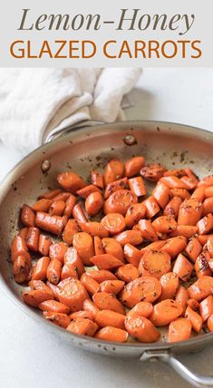 a pan filled with sliced carrots on top of a table