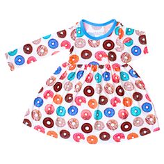 Get your little one ready to twirl in our Donuts twirltastic dress! Made from luxe viscose bamboo, this long sleeve dress is super soft to the touch. Its twirl-ready design and whimsical Donuts print make playtime so much fun! 93% Bamboo and 7% spandex Wash cold with like colors; stays soft wash after wash Line dry or tumble dry low and remove promptly Long Sleeve Twirl Ready Donut Dress Toddler, Donut Dress, Girls Fall Dresses, Lover Dress, Cute Donuts, Bodysuit Dress, Kids Dresses, Long Romper