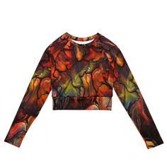 Introducing "Autumnal Beauty" Eco-Friendly Long-Sleeve Crop Top: Embrace Style with a Conscience!Elevate your activewear collection with our stunning "Autumnal Beauty" long-sleeve crop top, meticulously crafted with both style and sustainability in mind. Inspired by the mesmerizing hues of autumn, this original fluid art design brings a touch of elegance to your athletic endeavors and leisurely outings alike.**Eco-Friendly Excellence:**Made from a blend of recycled polyester and elastane, our cr Hippie Long Sleeve Crop Top, Orange Long Sleeve Printed Tops, Long Sleeve Graphic Print Hippie Top, Retro Long Sleeve Multicolor Print Top, Multicolor Retro Print Long Sleeve Top, Fluid Art, Long Sleeve Crop Top, Sustainability, Crop Top