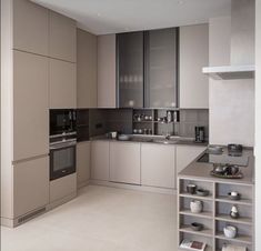 a modern kitchen with stainless steel appliances and cabinets