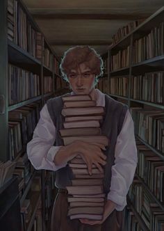 a man holding a stack of books in front of his face