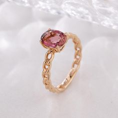 Oval-cut pink tourmaline ring. Like a rose blooming in the morning sun, it exudes a gentle and charming luster. Each of its cut lines is precise and elegant, bringing out the natural beauty of the stone as if it were a perfect combination of nature and exquisite craftsmanship. - Metal: 18K &14k Gold - Custom Color: Rose Gold, Yellow Gold, and White Gold - Gross weight:3.17g - Gemstones: Tourmaline - Tourmaline CTW:1.77（1 pc） - Size:6*8mm *Production time takes about 2-3 weeks from the day the order is in.* Elegant Pink Tourmaline Birthstone Ring, Pink Tourmaline Sapphire Ring, Oval Rose Gold Tourmaline Ring, Rose Gold Oval Tourmaline Rings, Rose Gold Ruby Tourmaline Ring, Rose Blooming, October Birthstone Ring, October Birthstone Rings, Pink Tourmaline Ring