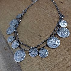 Necklace - oxidized sterling silver, Handmade jewelry, Raw silver coin, Coin pendant Necklace made of 925 silver. Silver oxidized and polished. The length of the necklace is 15.7-19.9 inches (40-50 cm), plus the regulatory chain 2 inches (5 cm). Coin have diameter 0.55-0.75 inches (14-19mm) Decoratively packed. Please write if you need changes. S H I P P I N G : If you need things for special occasions or by a certain date please ensure that you order in plenty of time as the postal system is no Sterling Silver Medallion Coin Necklace With Oxidized Finish, Sterling Silver Oxidized Medallion Coin Necklace, Handmade Sterling Silver Coin Necklace, Silver Sterling Silver Coin Necklace With Oxidized Finish, Sterling Silver Coin Necklace With Oxidized Finish, Sterling Silver Oxidized Coin Necklace, Silver Oxidized Coin Necklace, Silver Coin Necklace With Oxidized Round Pendant, Silver Oxidized Coin Necklace With Round Pendant