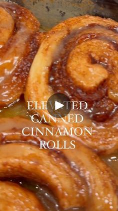 cinnamon rolls are being cooked in a skillet with the words, elly fried canned cinnamon rolls