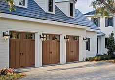 an image of a house with three garage doors