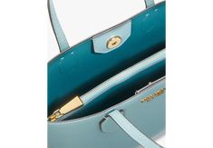 What's better than a crossbody or a tote? A crossbody tote of course. This versatile Bleecker style features an optional crossbody strap so you can easily sling it over your shoulder when you find your hands full. | Kate Spade Bleecker Medium Crossbody Tote, Aegean Teal Kate Spade Travel Top Handle Shoulder Bag, Kate Spade Top Handle Travel Shoulder Bag, Kate Spade Travel Shoulder Bag With Top Handle, Kate Spade Top Handle Shoulder Bag For Travel, Kate Spade Shoulder Bag With Detachable Handle For On-the-go, Kate Spade On-the-go Tote Shoulder Bag, Kate Spade Tote Shoulder Bag For On-the-go, Kate Spade Shoulder Bag For Travel With Gold-tone Hardware, Kate Spade Shoulder Bag With Gold-tone Hardware For Travel