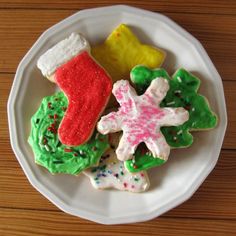 christmas cookies on a plate with decorations