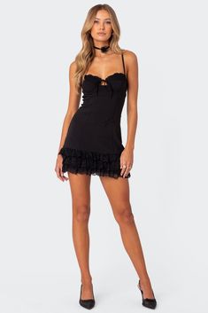 Online only! This Edikted lacey corset mini dress gives the perfect twist to a closet staple. With its delicate lace bust, fitted silhouette, and delicate ruffled trim, it will become an instant go-to.


	Mini dress
	Corset top
	Cupped construction
	Tie front detail
	Lace bust
	Adjustable straps
	Back zip closure
	Ruffle trim skirt
	Polyester, Spandex
	Model wears size S
	Model height is 5'8
	Item care: Wash with similar color Black Corset Dress, Visionary Fashion, Dress With Corset, Hoco Dress, Corset Mini Dress, Black Corset, Hoco Dresses, Fitted Silhouette, Corset Dress