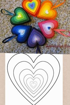 four heart shaped crochet patterns on the floor