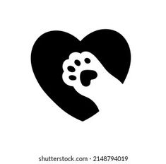 a heart with a paw inside it and a hand holding a dog's paw