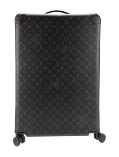 Men's black Louis Vuitton Monogram Eclipse Horizon 60 with silver hardware and retractable handle drop; rolled wheels at base; dual compartments at interior; single pocket at interior; nylon lining; and zip closure at side. Luggage tag included. Black Louis Vuitton, Candle Shop, Saint Laurent Bag, Work Bags, Accessories Jacket, Luggage Tag, Shirt Accessories, Christian Louboutin Shoes, Baby Month By Month