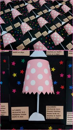 the lamp is made out of paper and has pink polka dot lampshades on it