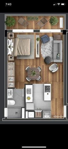 an overhead view of a living room and dining area in a small apartment with wood flooring