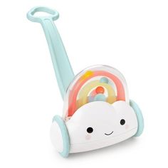 a toy that is shaped like a cloud with a rainbow on it's back