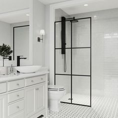 a white bathroom with two sinks and a shower