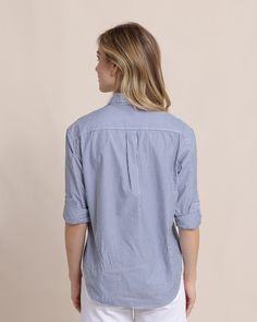 Polished and professional, this long-sleeve button-down gives you timeless style from the boardroom to the boardwalk. Our soft cotton top features a shirt tail hem and button cuffs for a custom fit that's both sophisticated and casual. Style: 10871 Classic Blue Blouse With Shirttail Hem, Classic Long Sleeve Blouse With Roll-up Sleeves, Classic Tops With Rolled Sleeves For Casual Gatherings, Classic Shirt For Casual Gatherings, Unstructured Button-up Tops With Roll-up Sleeves, Casual Dress Shirt With Placket For Office, Casual Office Dress Shirt With Placket, Classic Fall Blouse For Casual Gatherings, Classic Button-up Blouse For Casual Gatherings