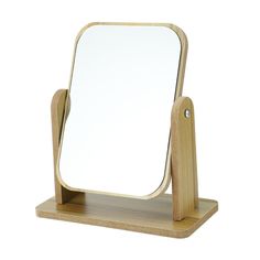 a wooden stand with a mirror on it's side and a light colored wood base