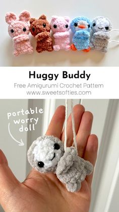 there are four small crocheted stuffed animals hanging from strings