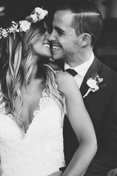 a bride and groom cuddle in front of the words custom order