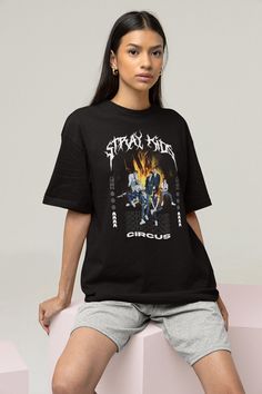 "Stray Kids Circus T-shirt, Stray Kids Maniac Shirt, Kpop Shirt, Kpop Merch, Stray Kids Stay, SKZ Streetwear, Korean Kpop, Seventeen, Exo This t-shirt is everything you've dreamed of and more. It feels soft and lightweight, with the right amount of stretch. It's comfortable and flattering for both men and women. * 100% Printed In The U.S.A - Ship Worldwide. Safe & Secure Checkout. * 100% combed and ring-spun cotton (heather colors contain polyester) * Fabric weight: 4.2 oz (142 g/m2) * Shoulder- Character Print T-shirt For Spring Streetwear, Trendy Character Print Shirt For Streetwear, Hip Hop Cotton Tops With Character Print, Black Kpop T-shirt With Graphic Design, Kpop Style Summer Top With Screen Print, Kpop Short Sleeve Shirt With Graphic Print, Kpop Cotton Tops With Screen Print, Kpop Style Cotton Shirt With Short Sleeves, Trendy Sublimation Print Tops For Concerts