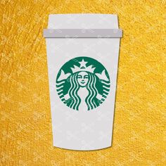 a starbucks cup on a yellow background