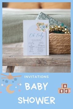 a baby shower is displayed on a wooden table