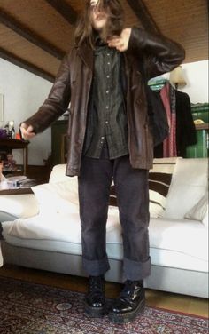 A mid-size person/girl wearing a black thrifted open waistcoat , a green wide flannel under it, black corduroy pants, black platform dr. Martens and multiple crystal rings and bracelets. Dark Brown Trench Coat, Fit Aesthetic Outfit, Custom Closet Organization, Hippie Grunge, Dr Martens Outfit, Cottagecore Outfit, Androgynous Outfits, Masc Outfits, Brown Trench Coat