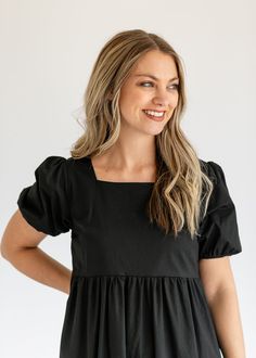 With a joyous style and modest fit, the Ava Square Neck Midi Dress creates a timeless midi dress that can go from day to night in a snap. We love the tiered skirt + the combination of the square neck and puff sleeves! A zipper on the side ensures she is easy to get on and off and sit perfectly across the bust. You are sure to love this clean + classic looking dress! Style: Midi, Short Sleeves SIZING TIPS Fit | Semi-Fitted Stretch | None Models | True to Size Square Neck Midi Dress, Modest Fits, Professional Wardrobe, Church Dresses, Back To School Shopping, Heritage Collection, The Square, Fall Collections, Tiered Skirt