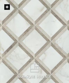 a white and grey marble tile pattern with diamond shaped tiles on the bottom half of it