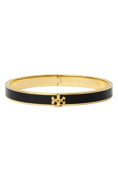 Add some of Tory's signature sophistication to your wrist stack with this enameled hinge bracelet clasped with iconic T-logo hardware. Goldtone or silvertone plate/enamel Imported | Tory Burch Kira Enamel Hinge Bracelet Classic Black Enamel Bangle Jewelry, Classic Black Enamel Bangle, Classic Black Enamel Bangle Bracelet, Tory Burch Bracelet, Hinge Bracelet, Wrist Stack, Wrist Stacks, Tory Burch Kira, Tory Burch Jewelry