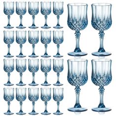 twelve blue goblets are lined up against a white background, each with an ornate design