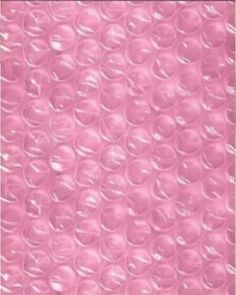 a pink background with lots of bubbles on it