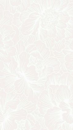 a white flower pattern on a light pink background