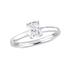 a white gold ring with a princess cut diamond