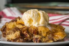 a slice of pecan pie with ice cream on top