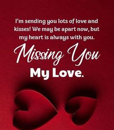 two hearts cut out of paper with the words missing you my love