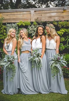 the bridesmaids are all wearing matching dresses