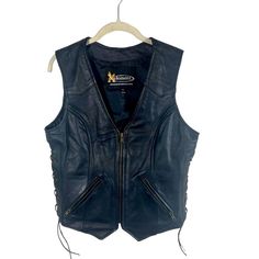 Xelement Women's Genuine Leather Vest  Size M Pre owned in good condition  Minor stain on one of the underarms  See pics for reference  Lace up sides  Full zip up Zip side pockets  Double interior pockets Leather Vest, Deep Purple, Forest Green, Favorite Outfit, Zip Ups, Art Collection, Genuine Leather, Bathing Beauties