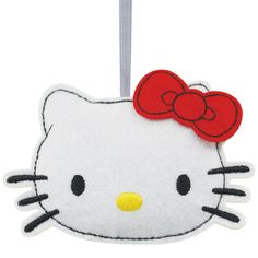 a hello kitty ornament hanging from a string