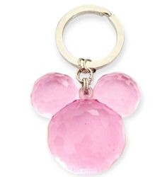 a pink mickey mouse keychain on a white background