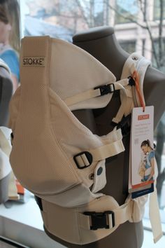 a close up of a baby carrier on display