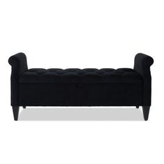 an upholstered black bench with buttons on the armrests and foot rest