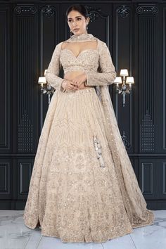 Add sparkle to your wedding day with our Bridal Lehenga BL-277! This beautiful lehenga features intricate sequin and beads embroidery, perfect for catching the eyes of your guests. Be the center of attention in this stunning piece, fit for a queen. White Bridal Lehenga, Beautiful Lehenga, Blouse With Long Sleeves, Beads Embroidery, Embellished Skirt, White Bridal, Intricate Patterns