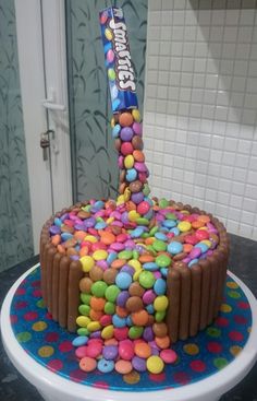 a birthday cake decorated with candy and candies