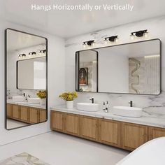 a bathroom with two sinks, mirrors and a tub in the background that says hangers horizontally or vertically